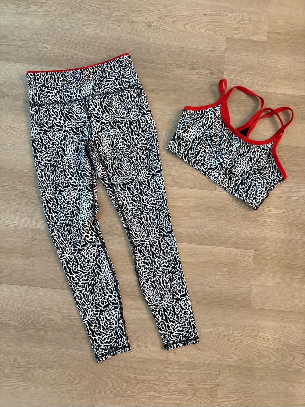 Fabletics Black & White Animal Print Sports Bra and Leggings with Red Trim